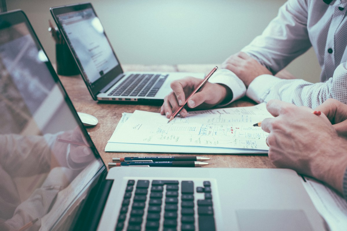 Business owners reviewing company documents